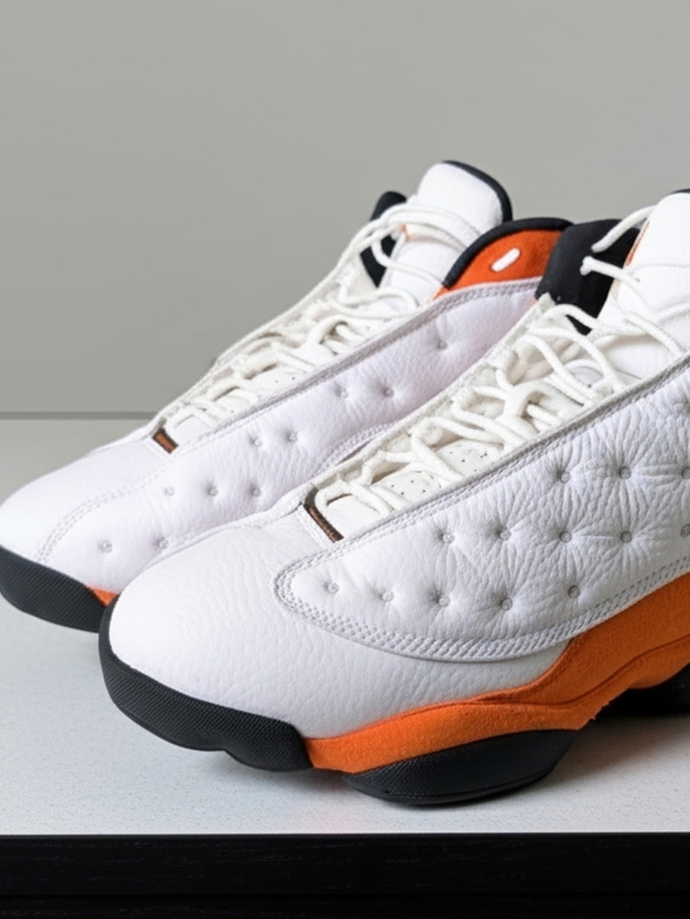 Air Jordan 13 (White / Orange / Black – “Starfish” colorway)